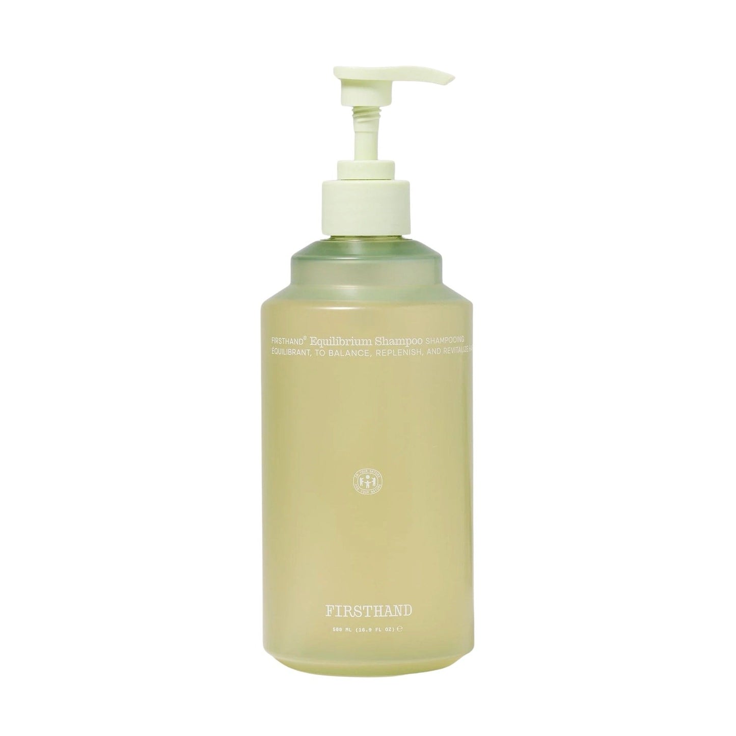 Beige bottle with pump on a white background