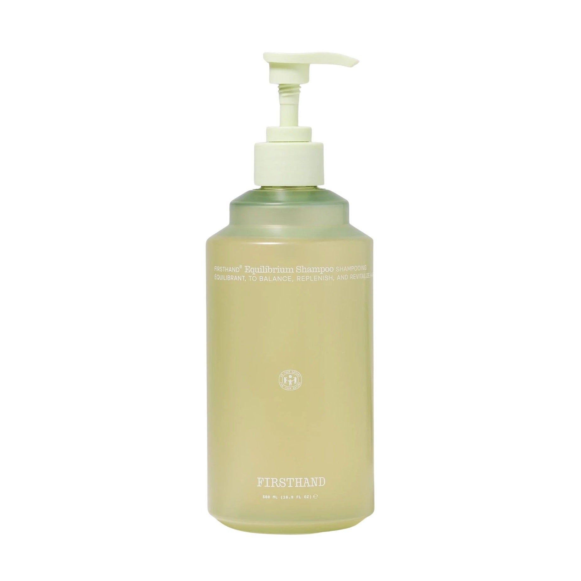 Beige bottle with pump on a white background