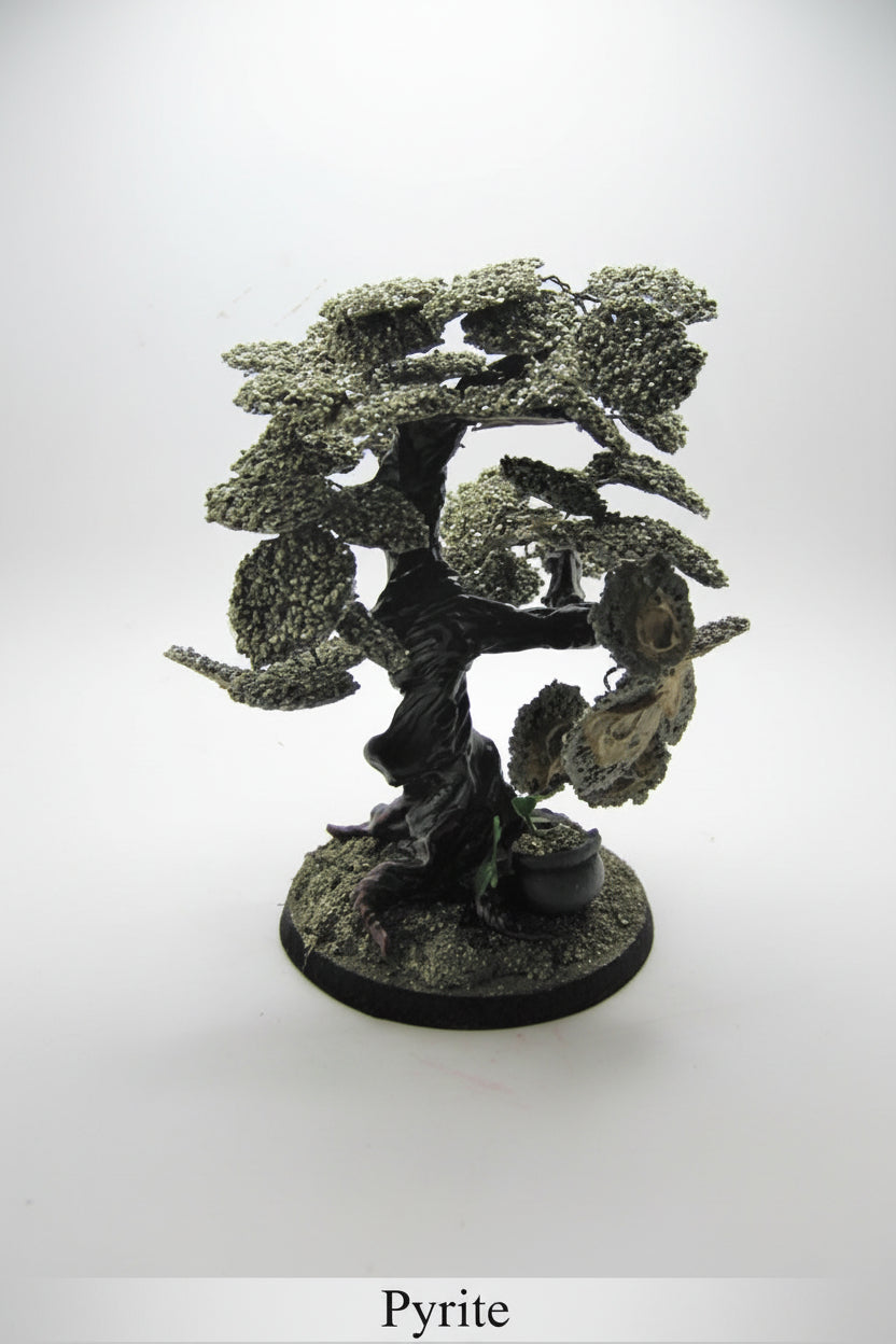 Decorative tree figurine with a tag on a white background