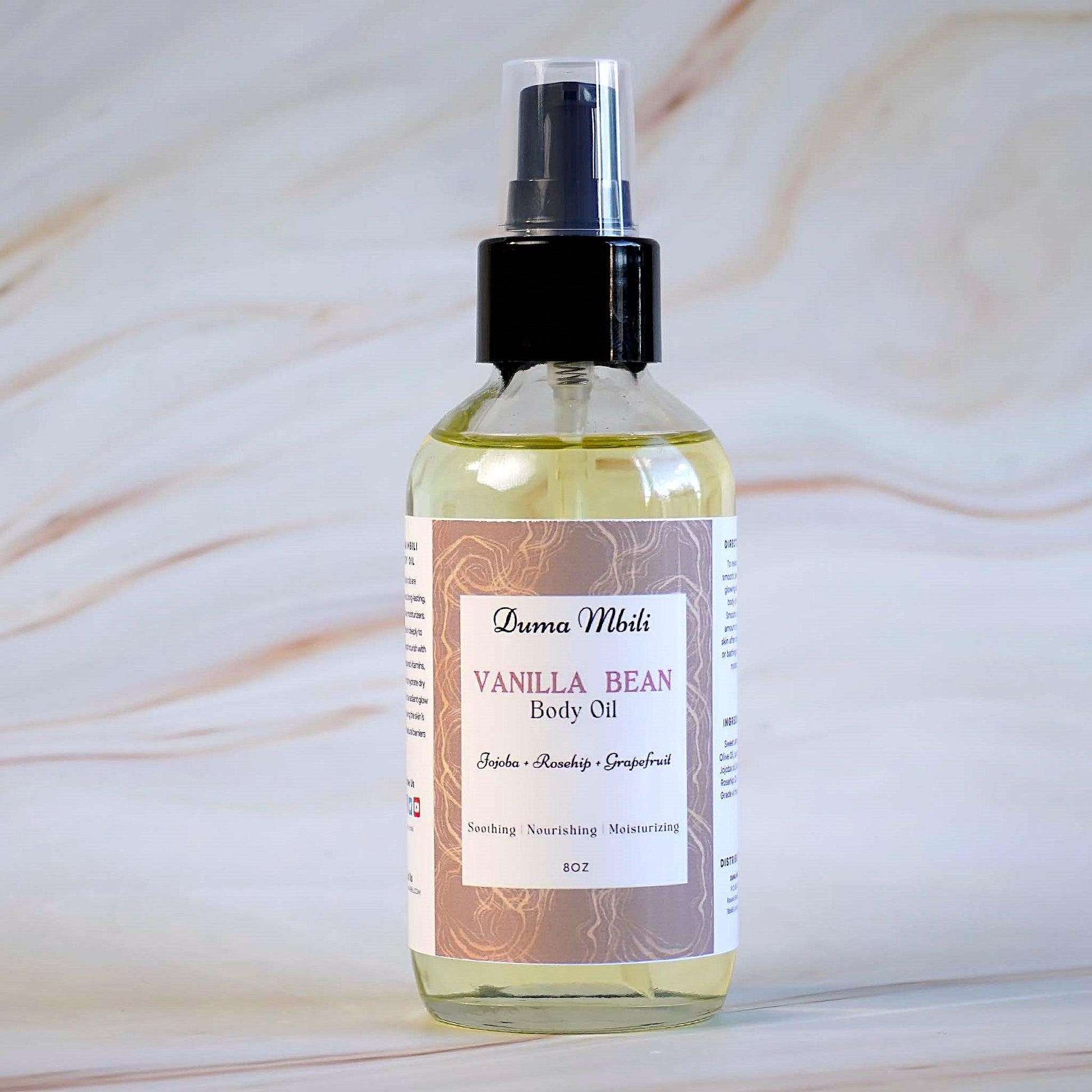Vanilla Bean body oil bottle with a label on a light background