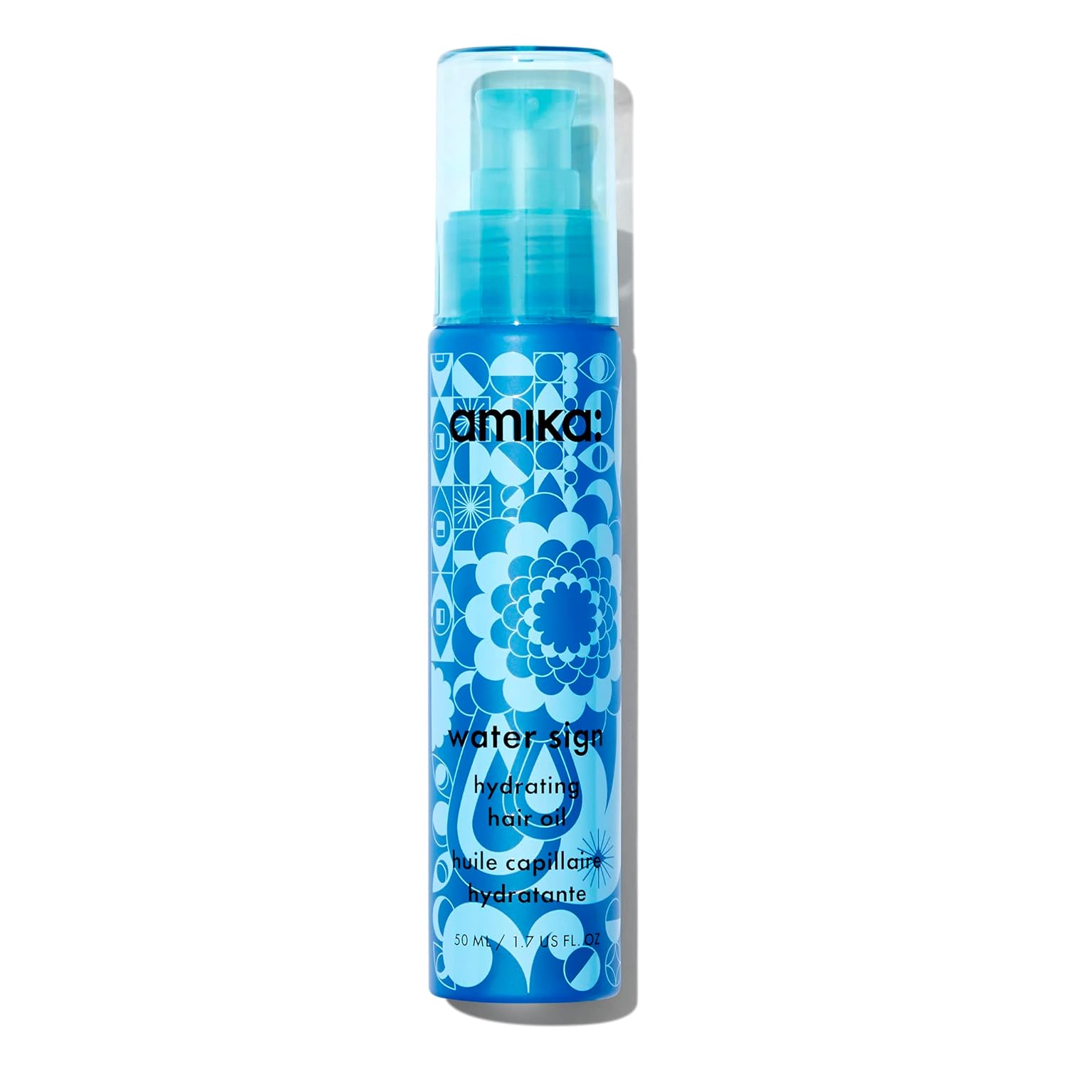 Blue hair product bottle with floral design on a white background