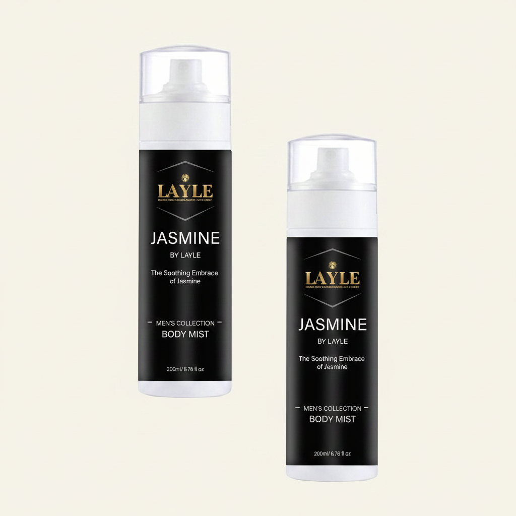 Two bottles of Layle Jasmine by Layle Men's Collection Body Mist on a light cream background. One bottle is standing upright on its side, and the other is standing upright, both showing the black label with gold and white text.