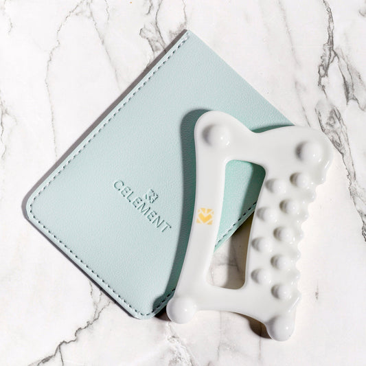 Light blue cardholder with 'ClearFire' branding on a marble surface