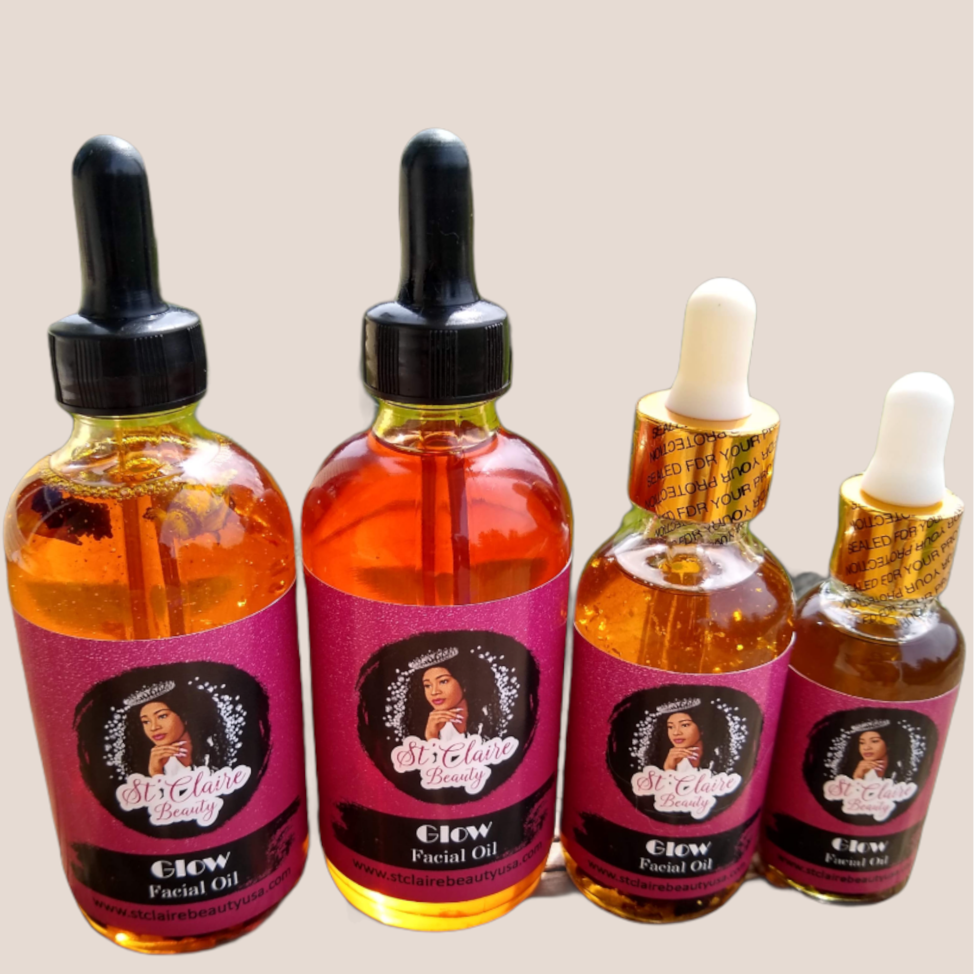 Four bottles of 'Glow' facial oil with dropper caps on a beige background