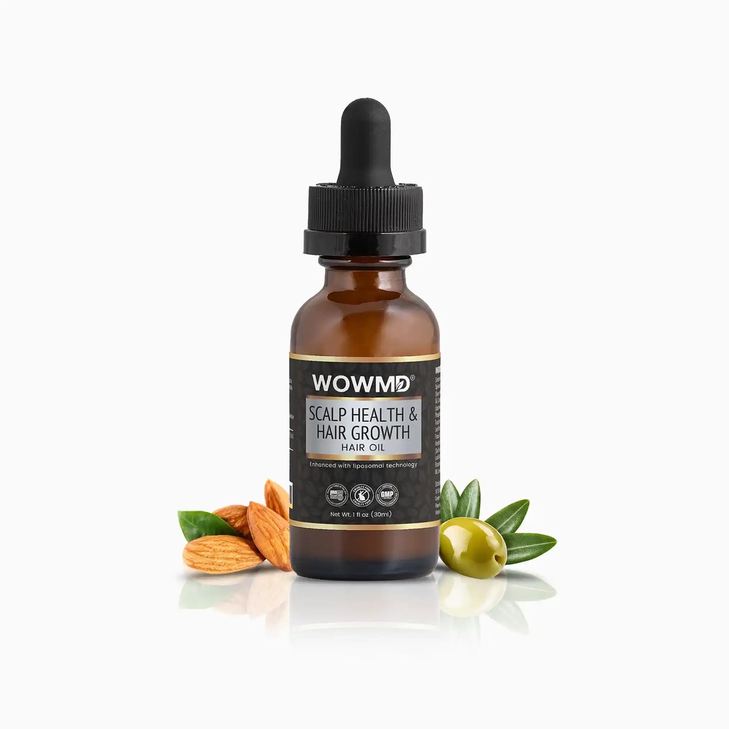 Brown bottle of WOWMD scalp health and hair growth hair oil with a dropper on a white background.