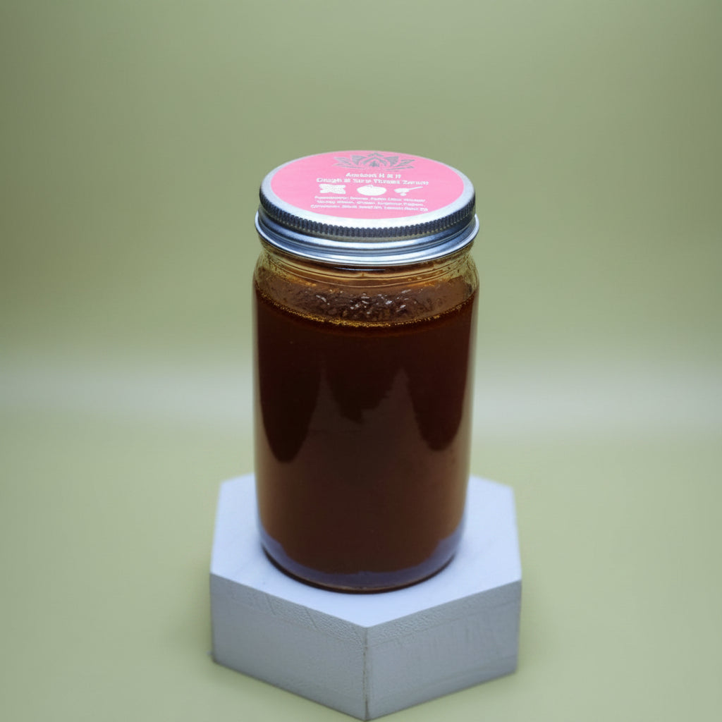 Jar of honey with a pink lid on a beige background