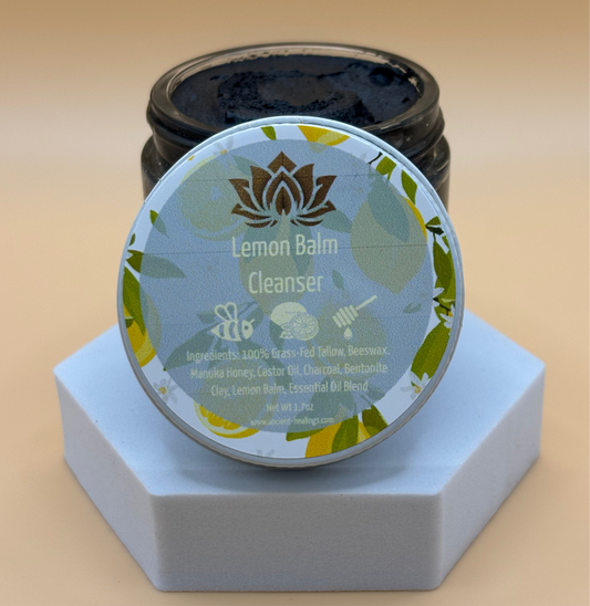 Lemon Balm Cleanser jar with label on a beige background